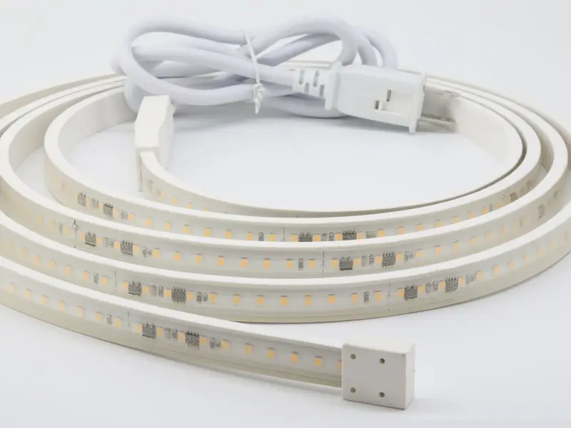 Single color 120V LED strip coiled with its plug-in power cord attached