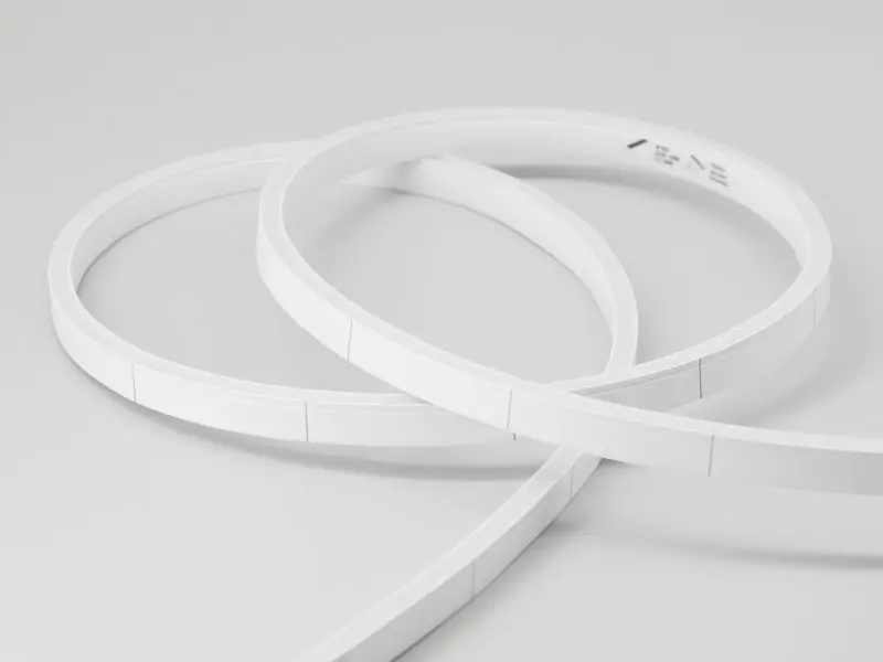 Side-bend LED neon flex coiled edgewise showing its slim profile
