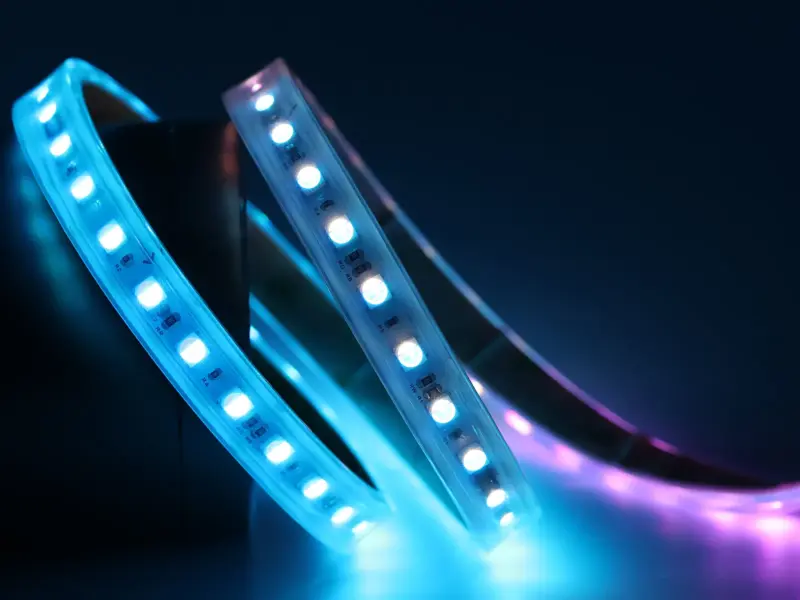 Addressable RGBW strip for permanent soffit lighting with pixels lit in color