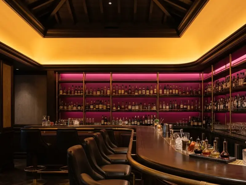 Bar cove and backbar lit in amber and magenta by RGBW LED strip