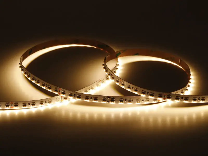 Side-view 3014 SMD LED strip coil emitting warm light from its edge