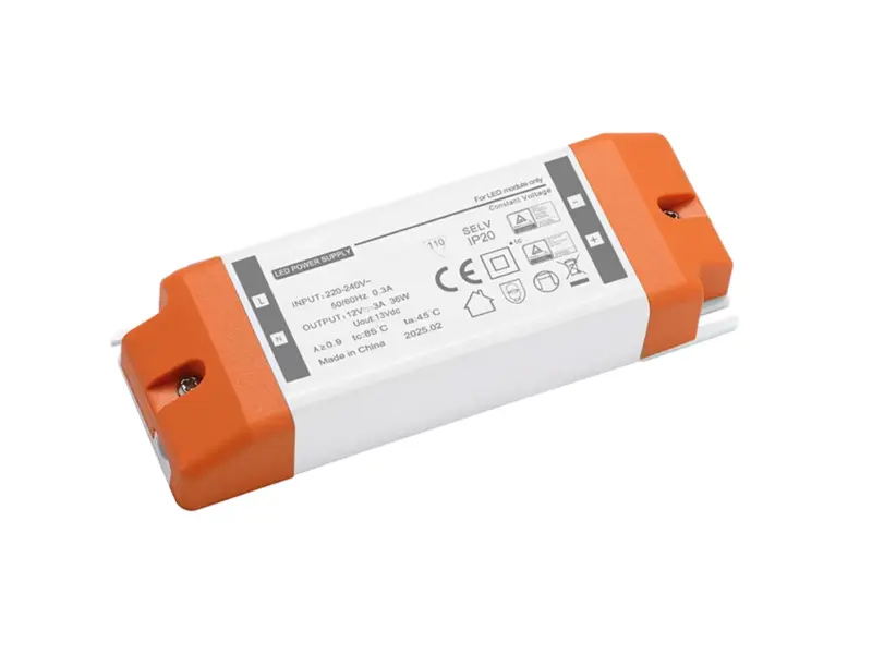 Compact constant-voltage LED power supply with screw terminals and orange end caps, IP20 case