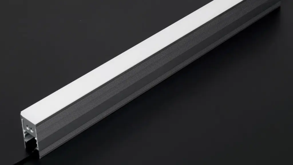 UT-APT3055 in-ground linear light profile with a 10 mm PMMA cover, shown unlit on a dark background