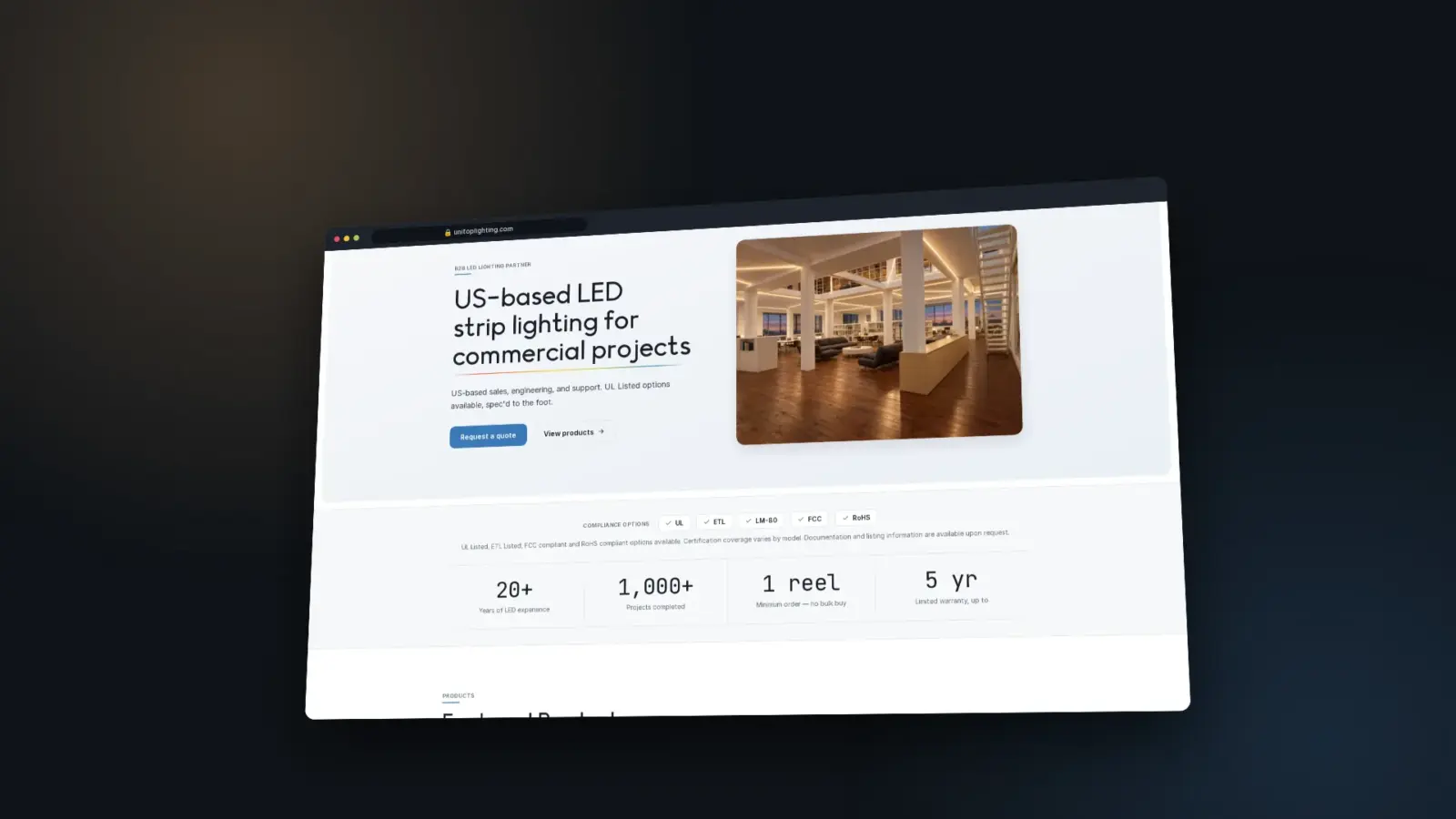 The unitoplighting.com homepage shown in a tilted browser window on a dark background